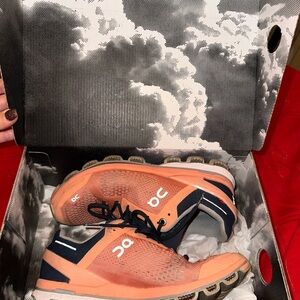 On Running Athletic Shoes in Orange and Navy